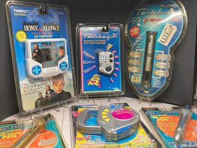 Talk boy lot of 6  units new sealed. Tiger Electronics Home alone
