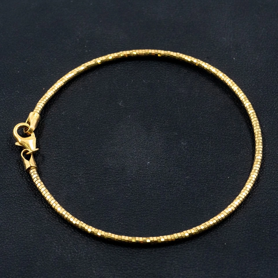 Brazalete redondo de oro amarillo de 18k Foto 3 de 4