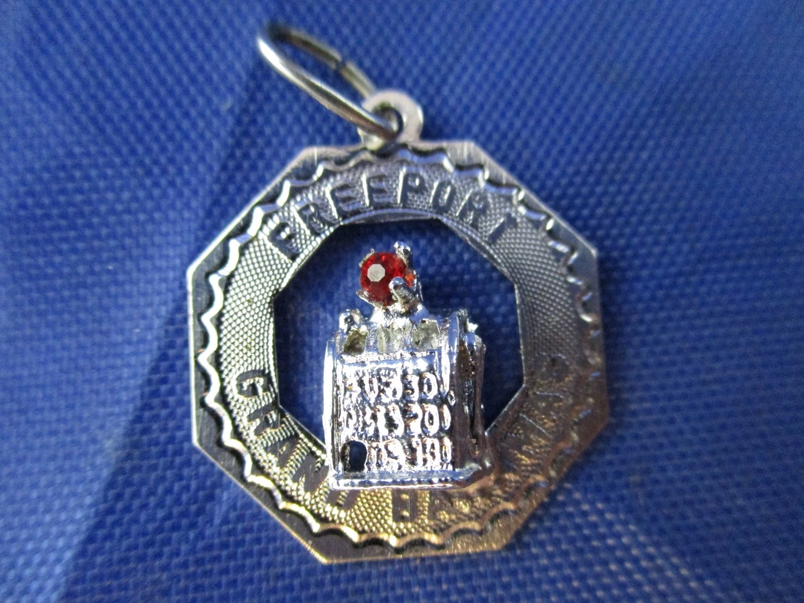 STONE ISLAND VINTAGE ARGENTO STERLING PORTO LIBERO GRAND BAHAMAS CON UN CIONDOLO PIETRA ROSSA