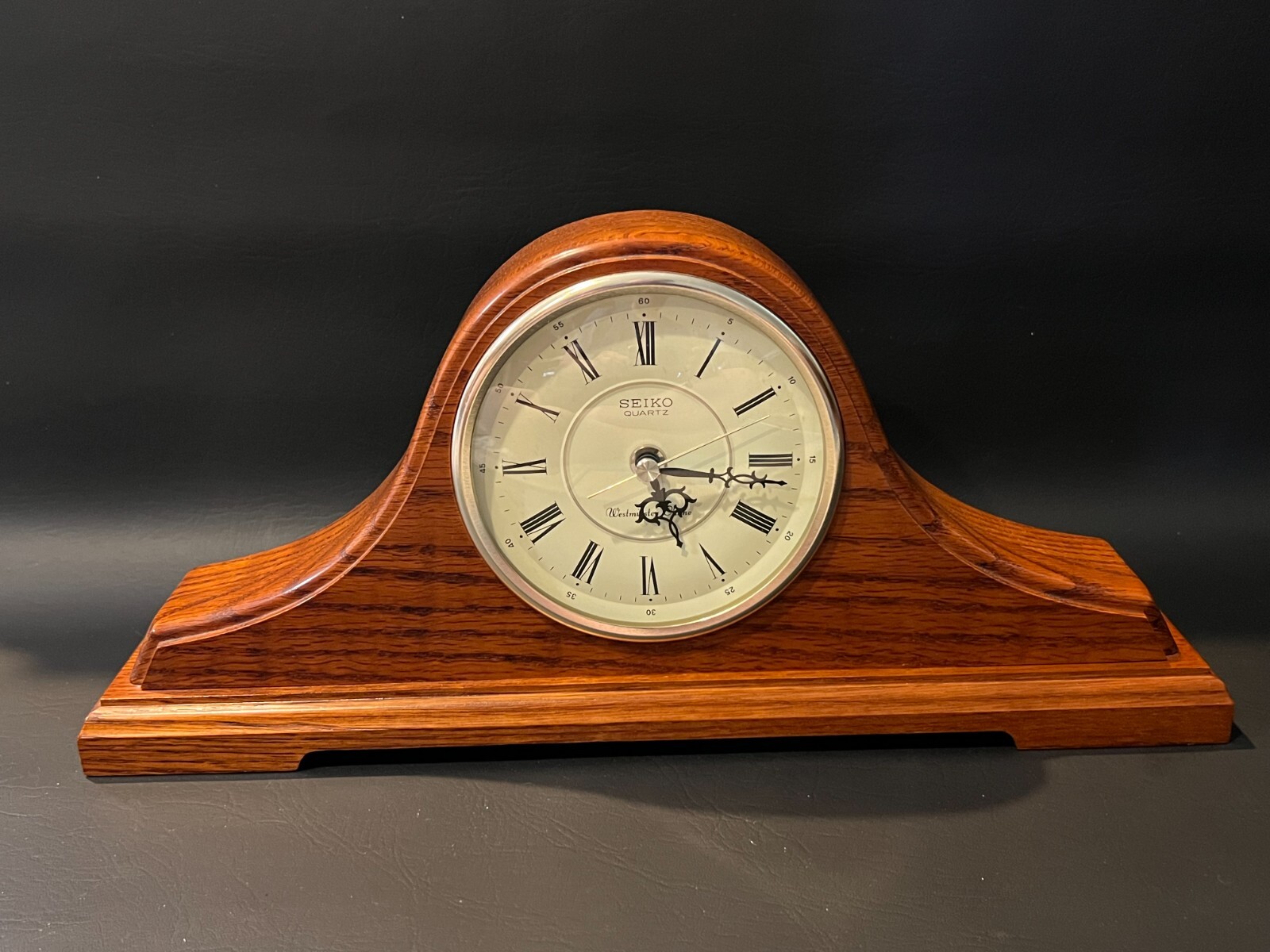 Seiko Quartz Westminster Chime Oak Mantel Desk Clock, 16 1 / 4 " Wide, 7 1 / 2 " High photo Seiko Quartz Westminster Chime Oak Mantel Desk Clock, 16 1 / 4 " Wide, 7 1 / 2 " High featured image