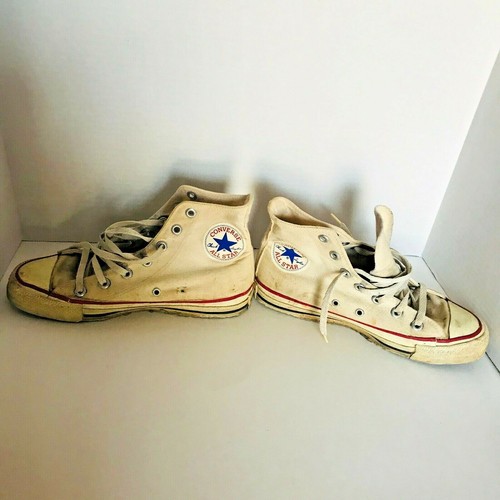 White Chuck Taylors Hi Tops 