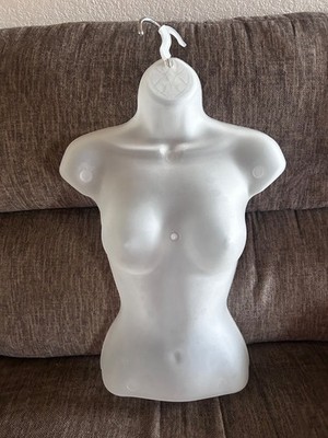 Twelve half hanging  Mannequins for boutique use. Plastic, good condition.