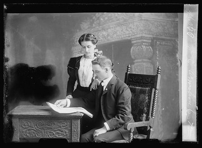 Photo:J.E. Armstrong Portrait Studio Man Woman Reading Document 1894-1901