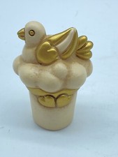 Thun gli oggetti decorativi vasetto Colombina. Altezza 6 cm. Champagne.