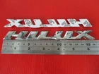 WITH FOR TOYOTA  HILUX PICKUP 1989-1992 LOGO CHROME BADGE EMBLEM 2 Pcs. (si374)