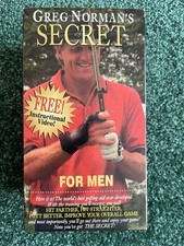Greg Norman’s Secret For Men Golf Swing Training Aid with Instructional VHS Tape