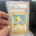 Nintendo 2001 Pokemon Black Star Promo Surfing Pikachu 28/53 PSA 9 English