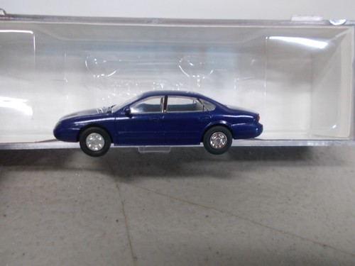 Coche Ford Taurus ATLAS # 1271 ~ 1996 - COLOR AZUL CLARO DE LUNA ~ ESCALA HO | Condition: New