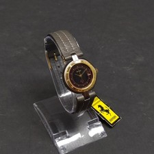 Orologio Ferrari Formula al quarzo dorato e nero con libretto. Mai usato