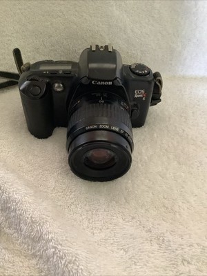 Canon EOS Rebel XS 35mm SLR Film Camera W/Canon 35-80mm Zoom Lens Strap Case