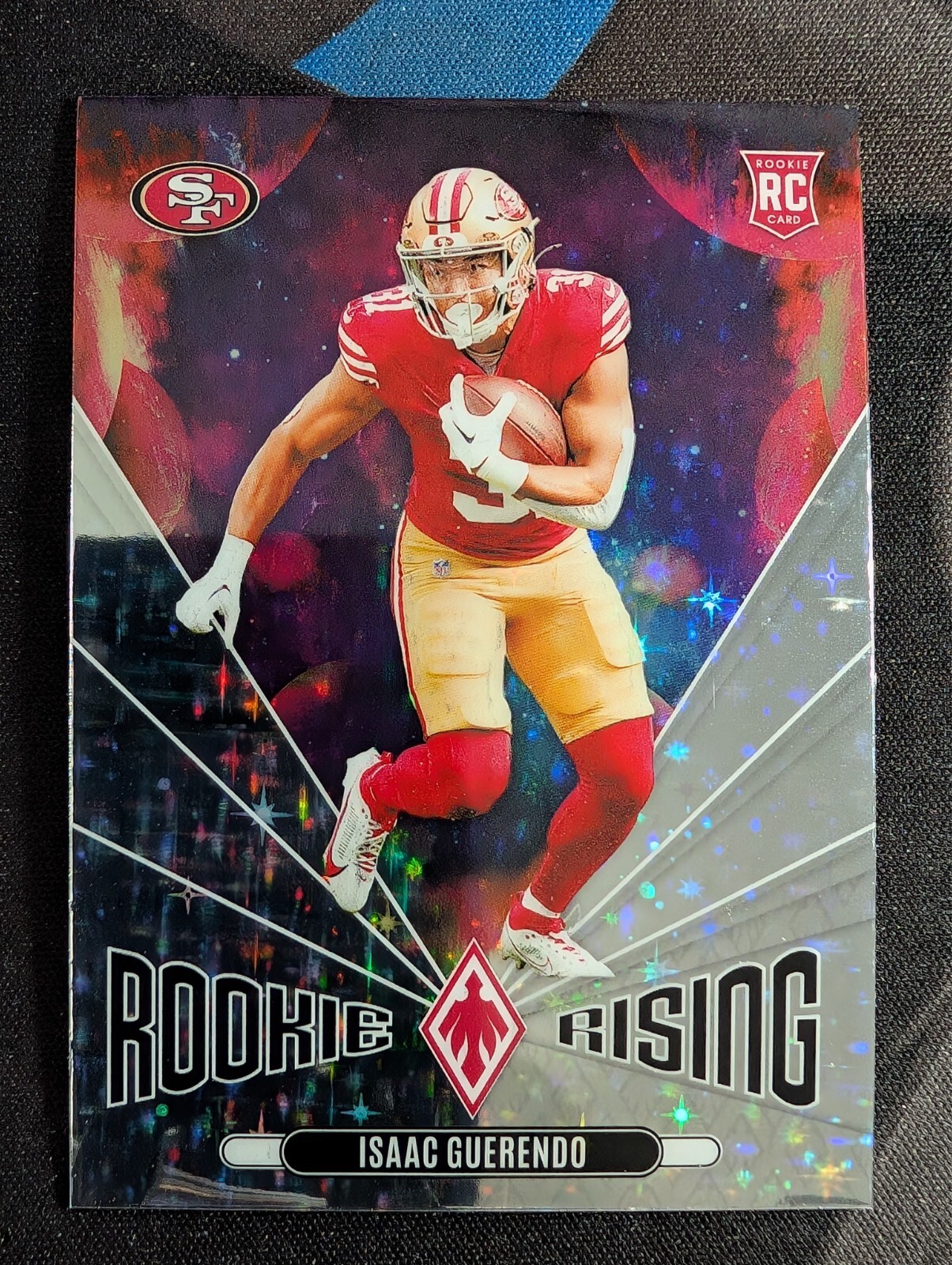 2024 Panini Phoenix - Rookie Rising Isaac Guerendo Silver Stars Holo Card (RC)