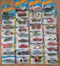 LOT OF 32 NEW HOT WHEELS VEHICLES 2