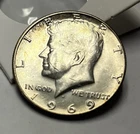 1969-D Kennedy Half Dollar 40% Silver - AU About Uncirculated.