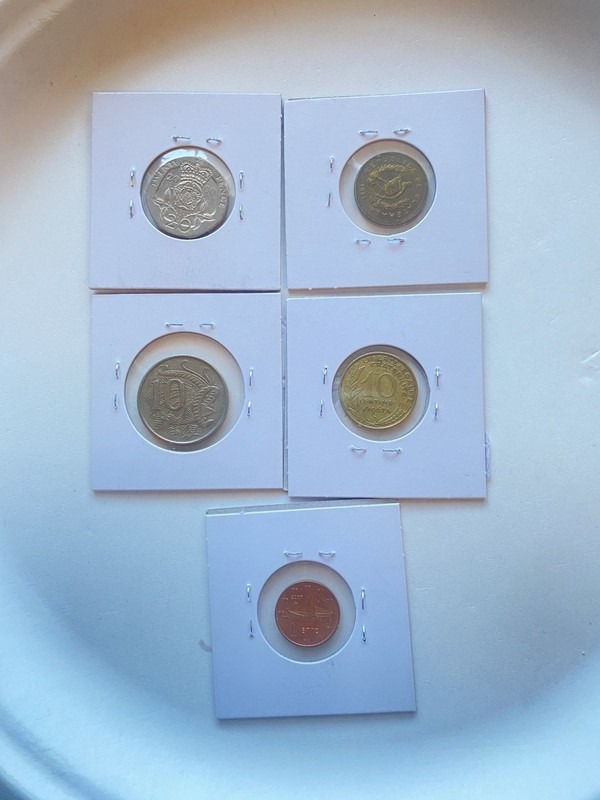 Uncertified Ungraded World Coin Lot in Holders (1966-2007)