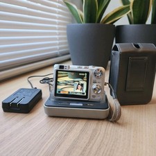 Casio Exilim Zoom EX-Z750 7.2MP Digital Camera W/ USB Cradle CA-26 - ****** READ