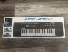 Alesis Harmony 32 32-Key Portable Electronic Keyboard, Speakers, Mic  Stand