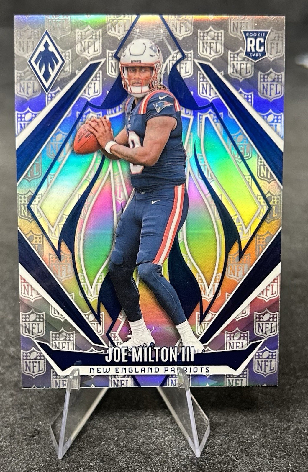 2024 Panini Phoenix Rookies Joe Milton III #205 NFL Shield /150 (RC)