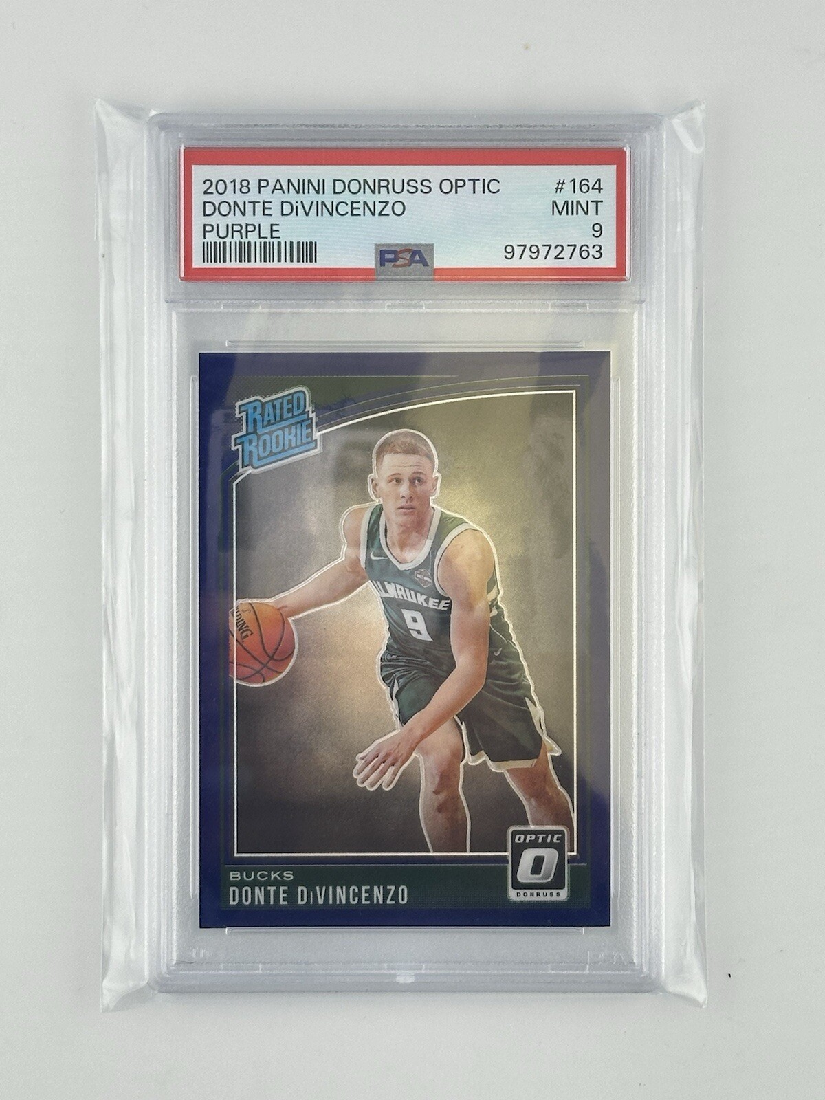 2018 Panini Donruss Optic Purple Prizm #164 Donte DiVincenzo Bucks NBA PSA 9