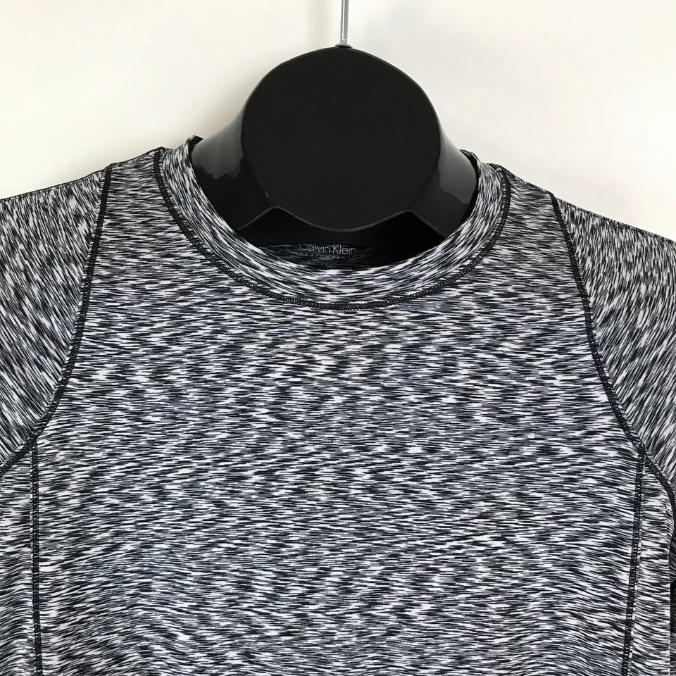 Camisa Calvin Klein Performance de secado rápido para mujer pequeña cuello redondo elástica activa Foto 2 de 4