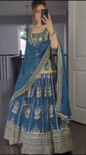 Latest Designer Faux Georgette Top Lehenga With Dupatta For Reception