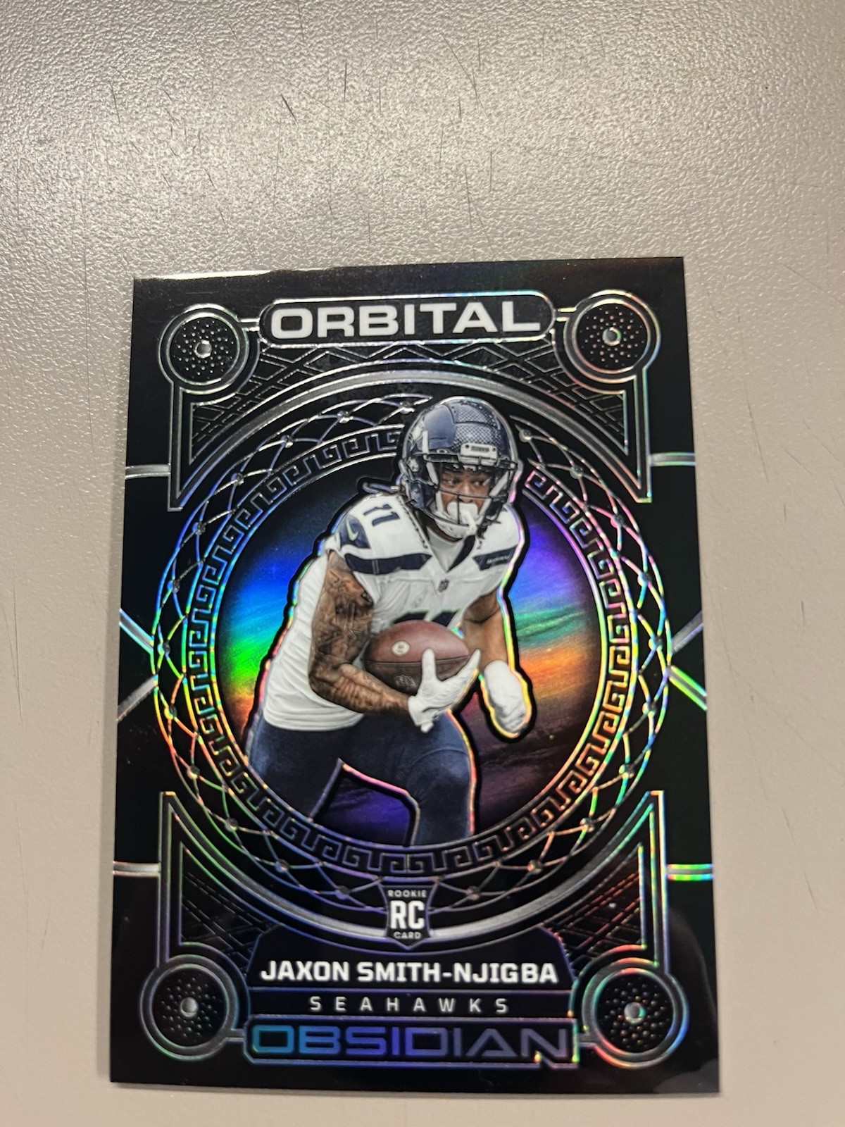 2023 Panini Obsidian - Orbital #21 Jaxon Smith-Njigba /135 (RC)