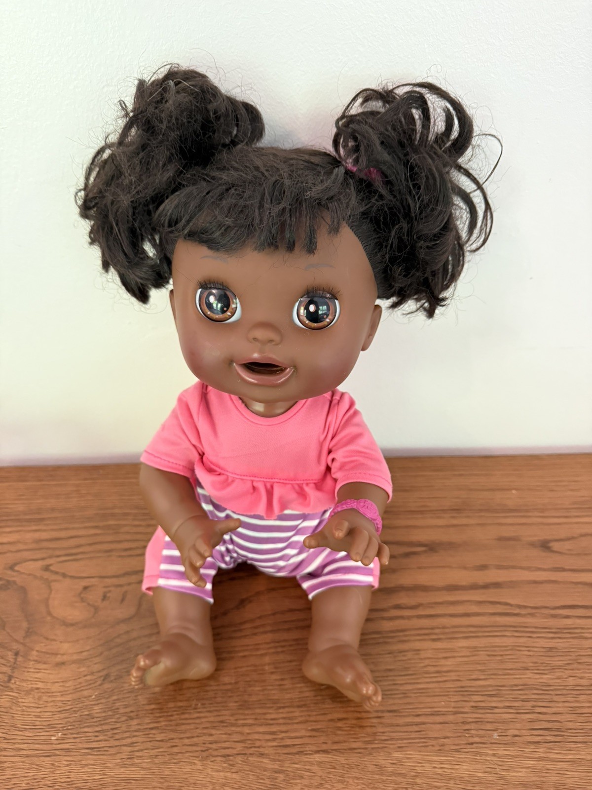 Baby Alive Real Surprises English Spanish Speaking, Dark Hair Brown Eyes.