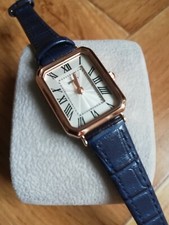 Montre femme chiffre romain bracelet cuir couleur bleu foncé ref 04