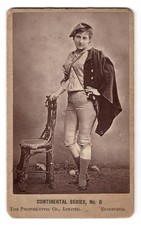 An 1890s carte-de-visite of a burlesque woman cross-dressing in tight trousers — a rare, cheeky slice of Victorian gender-bending performance culture.