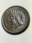 1884 Indian Head Cent AU brown with traces of red pleasing coin