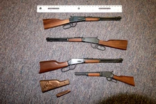 Custom scale model lever action rifles.  Sold as each.