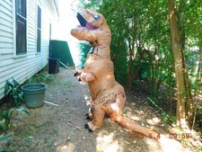 JURASSIC WORLD T-Rex inflatable costume with fan used/works 9 1/2 ft long