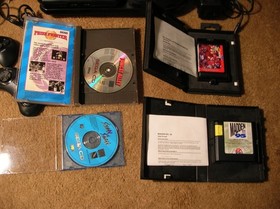 sega cd model 2 console and genesis/ w games