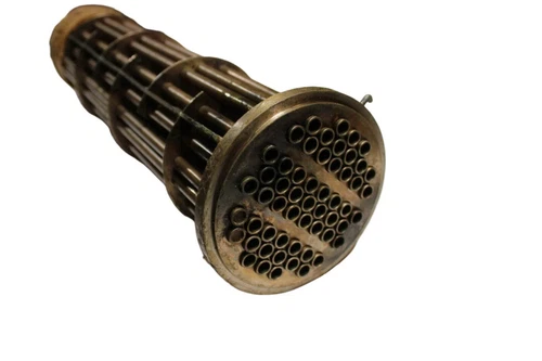 Bronze Dresser-Rand 3125B oil cooler with circular water passages and ribbed heat exchanger design on white background.
