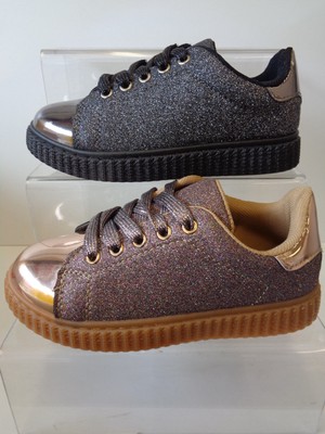 black and rose gold trainers