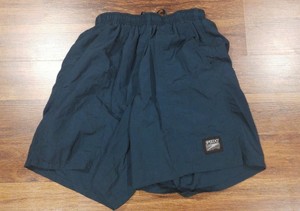 dark green swim trunks