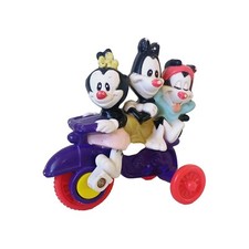Juguetes Happy Meal de McDonald's de colección 1993 personajes animaniacs en bicicleta púrpura