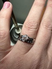 Diamond Engagement Ring and custom Blue Sapphire Wedding Band.