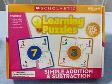 NEW SEALED SCHOLASTIC LEARNING PUZZLES SIMPLE ADDITION  SUBTRACTION AGES 5  UP