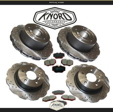 JUEGO DE 2 DISCOS Y ALMOHADILLAS ONDULADOS PERFORADOS Y RANURADOS DELANTEROS Y TRASEROS LAND ROVER DISCOVERY