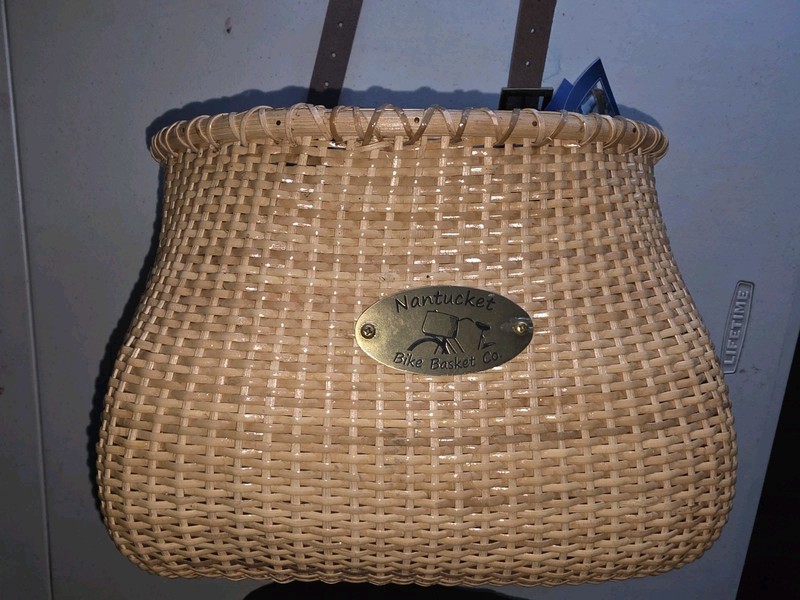 Handwoven rattan bicycle basket by Nantucket Bike Basket Co.