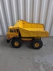 Tonka Turbo Diesel Dump Truck XMB 975 Yellow Pressed Steel Toy