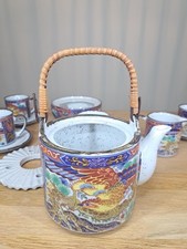 Porcelain Japanese tea set. Teapot with warming saucer, 3x cup and