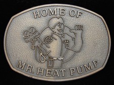 OF09149 NOS VINTAGE 1970s HOME OF MR. HEAT PUMP COMPANY BRASSTONE BUCKLE