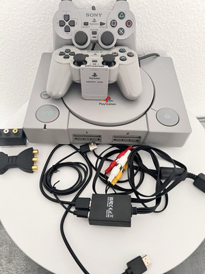 PS 1 Konsole  mit 2 Controllern, Memory Card, Kabeln, 12Spielen  