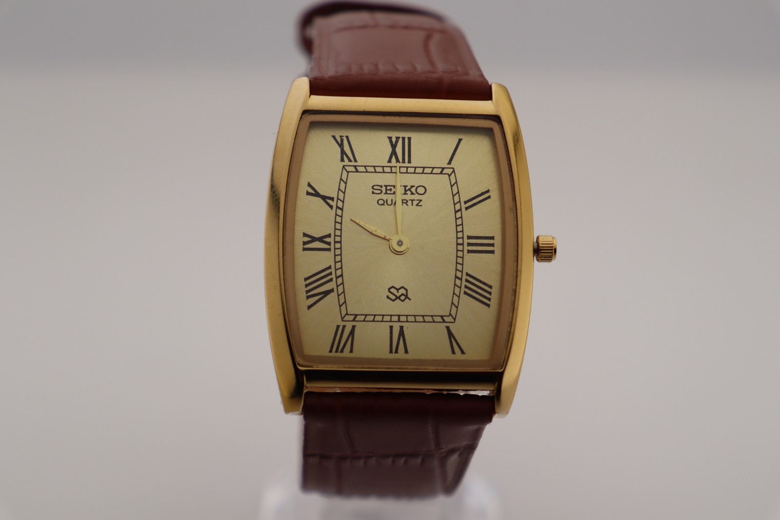 Vintage Seiko Barrel-Tank Quartz Gold Dial Men's Watch with Light-Brown Strap