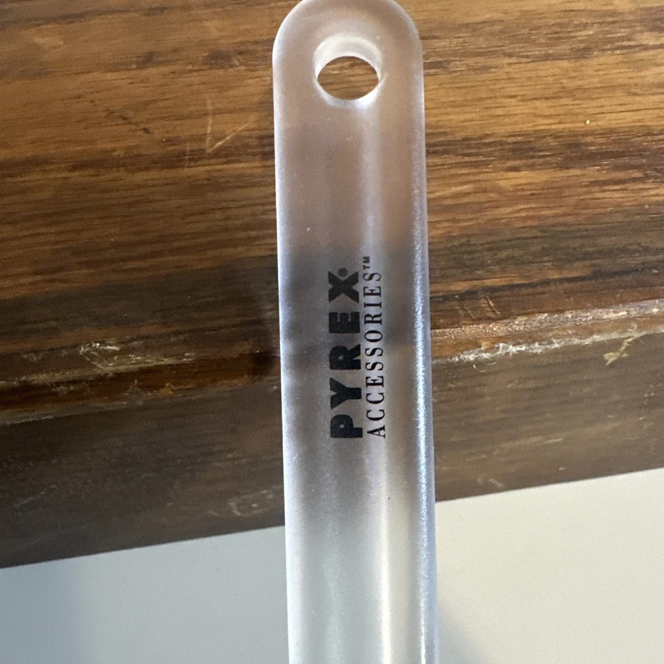 "Accesorios Pyrex, espátula de silicona, color amarillo, mango transparente de 11 3/4"" de largo" Foto 2 de 4