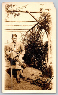 Vintage 1920s Photo Dapper Man in Suit Argyle Socks Sitting in Garden Trellis