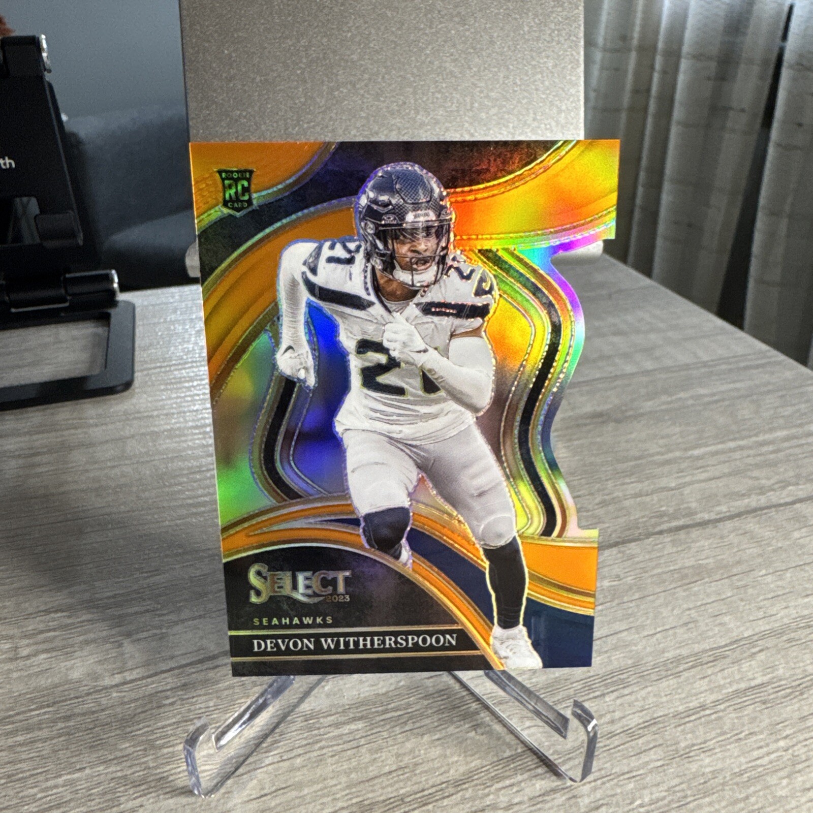 2023 Select NFL #273 Devon Witherspoon Club Level Orange Die-Cut /399 - RC
