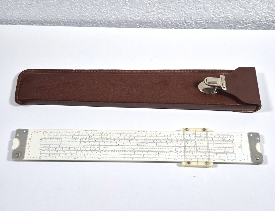 A 1954 Dietzgen Duplex Log Log slide rule with Microglide action and original leather case — mid-century engineering elegance at its most tactile.