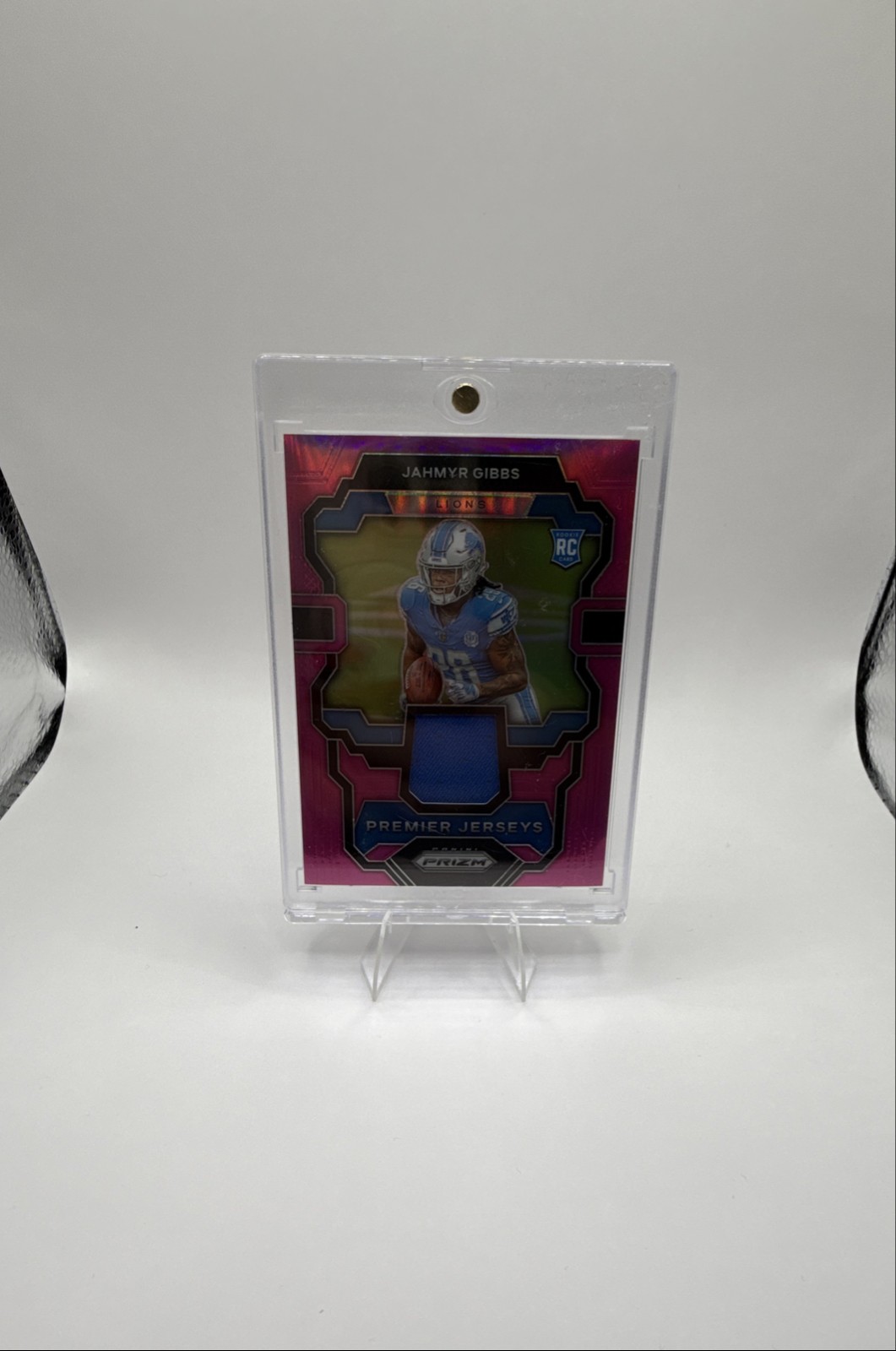 2023 Panini Prizm - Premier Jerseys Jahmyr Gibbs #PJ-JG Pink Prizm (MEM, RC)